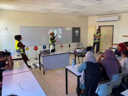 السلامة المجتمعية : فعاليات مُرورية في واحة النخيل الابتدائية بقرية سعوة